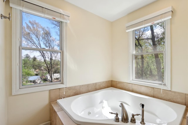 full bath featuring a jetted tub