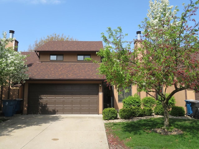 1321 Dresden Dr Unit C, Morris, IL 60450 - view of front of property with a shingled roof and concrete driveway