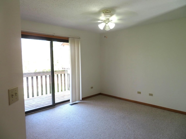 1321 Dresden Dr Unit C, Morris, IL 60450 - carpeted spare room with baseboards, a ceiling fan, and visible vents
