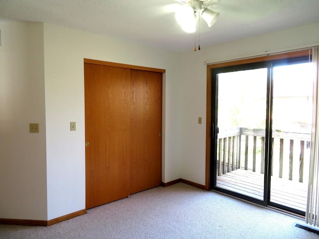 1321 Dresden Dr Unit C, Morris, IL 60450 - interior space featuring a ceiling fan, baseboards, visible vents, and light carpet