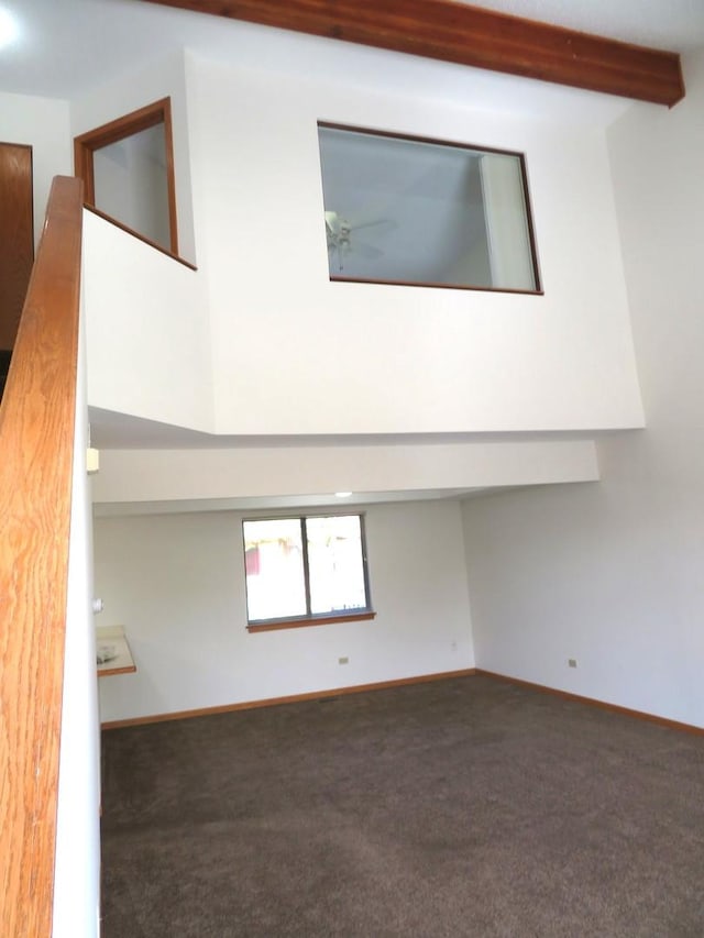 1321 Dresden Dr Unit C, Morris, IL 60450 - interior space with baseboards, carpet flooring, and beam ceiling