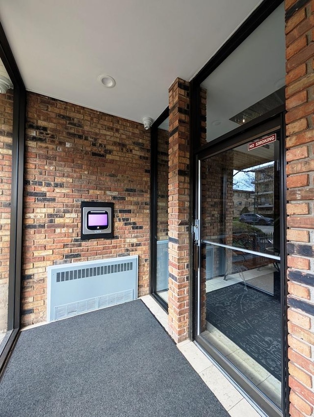 interior space with radiator and a garage