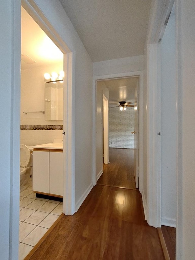 corridor featuring light wood-type flooring