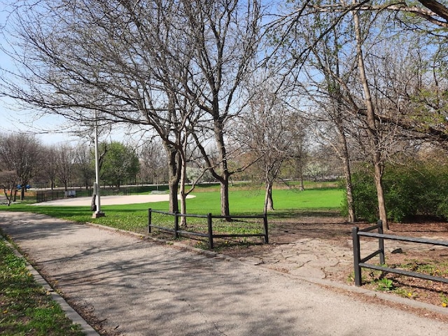 5030 N Keeler Ave, Chicago, IL 60630 - surrounding community featuring a lawn and fence