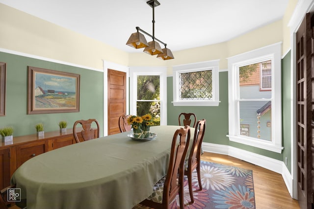 3231 Wesley Ave, Berwyn, IL 60402 - dining room with baseboards and wood finished floors