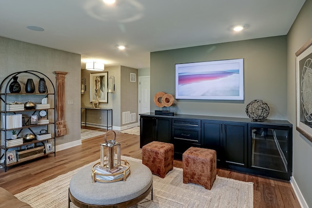 4187 Chelsea Manor Cir, Aurora, IL 60504 - interior space with baseboards, visible vents, wood finished floors, and a bar