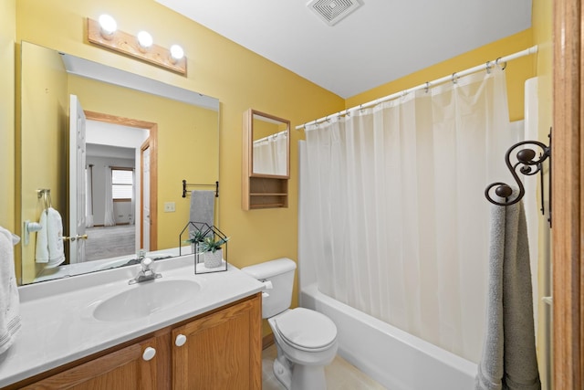 471 W Miller Ave, Hinckley, IL 60520 - bathroom featuring vanity, toilet, and shower / bath combo with shower curtain