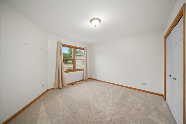471 W Miller Ave, Hinckley, IL 60520 - unfurnished room with light colored carpet and baseboards