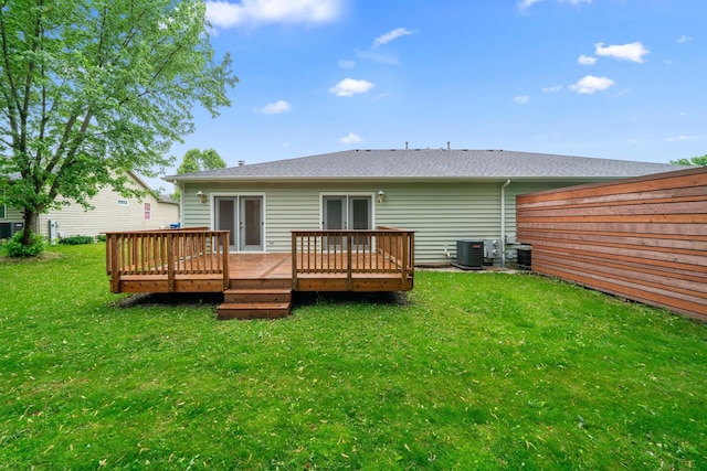 471 W Miller Ave, Hinckley, IL 60520 - back of property with central AC, a deck, and french doors