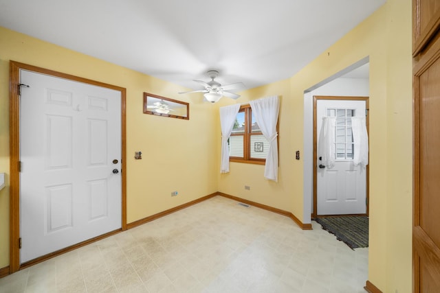 471 W Miller Ave, Hinckley, IL 60520 - entrance foyer featuring light flooring, ceiling fan, and baseboards