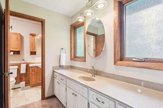 38413 N Tewes Ct, Beach Park, IL 60087 - bathroom featuring toilet, vanity, a baseboard radiator, and plenty of natural light
