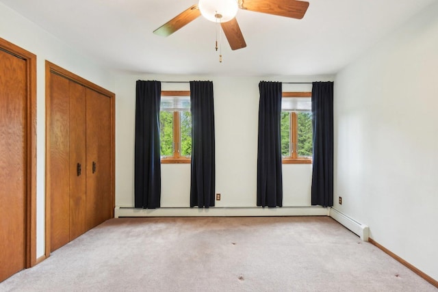 38413 N Tewes Ct, Beach Park, IL 60087 - unfurnished bedroom with multiple windows, two closets, carpet, and ceiling fan
