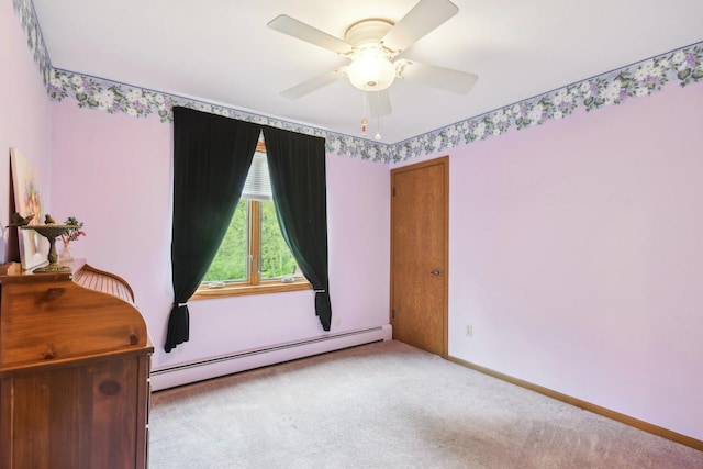 38413 N Tewes Ct, Beach Park, IL 60087 - empty room featuring a baseboard radiator, carpet flooring, a ceiling fan, and baseboards