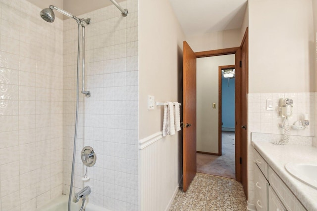 38413 N Tewes Ct, Beach Park, IL 60087 - full bath featuring shower / washtub combination, vanity, a wainscoted wall, and tile patterned floors