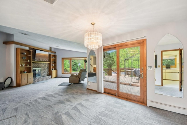 38413 N Tewes Ct, Beach Park, IL 60087 - unfurnished living room featuring a baseboard radiator, carpet, a chandelier, a fireplace, and arched walkways