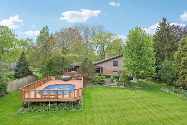38413 N Tewes Ct, Beach Park, IL 60087 - view of green lawn featuring a hot tub and a deck