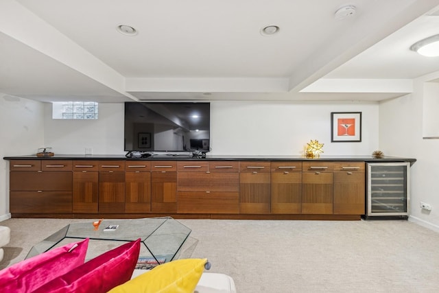 bar featuring wet bar, baseboards, wine cooler, light carpet, and recessed lighting