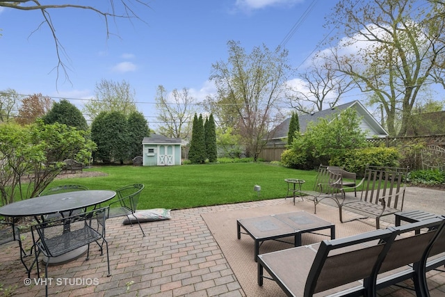 1625 Central Ave, Wilmette, IL 60091 - view of patio / terrace with an outdoor structure, outdoor dining area, fence, and a storage unit