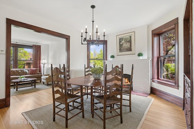 1625 Central Ave, Wilmette, IL 60091 - dining area with an inviting chandelier and light wood-type flooring