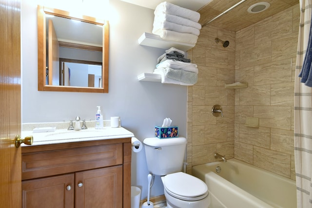 full bathroom featuring toilet, shower / tub combo, and vanity