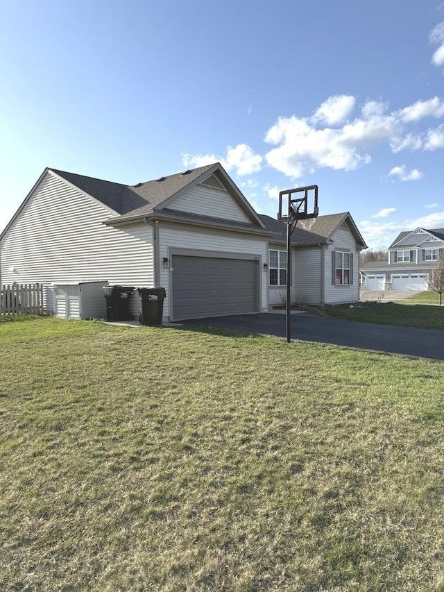10817 Quail Xing, Richmond, IL 60071 - exterior space featuring a front yard, aphalt driveway, and an attached garage
