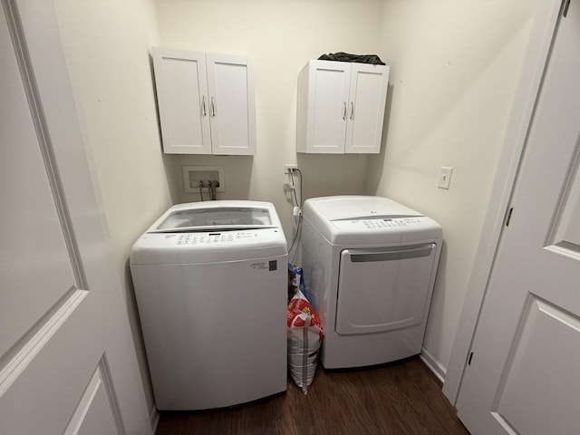 10817 Quail Xing, Richmond, IL 60071 - laundry room with dark wood-style flooring, washing machine and clothes dryer, and cabinet space