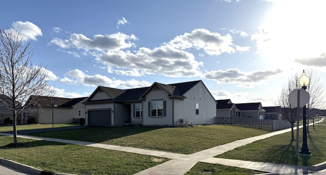 10817 Quail Xing, Richmond, IL 60071 - ranch-style home with fence, a front yard, aphalt driveway, and an attached garage