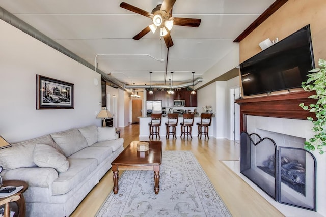 170 N NW Hwy Unit 410, Park Ridge, IL 60068 - living room with rail lighting, light wood-style floors, and ceiling fan