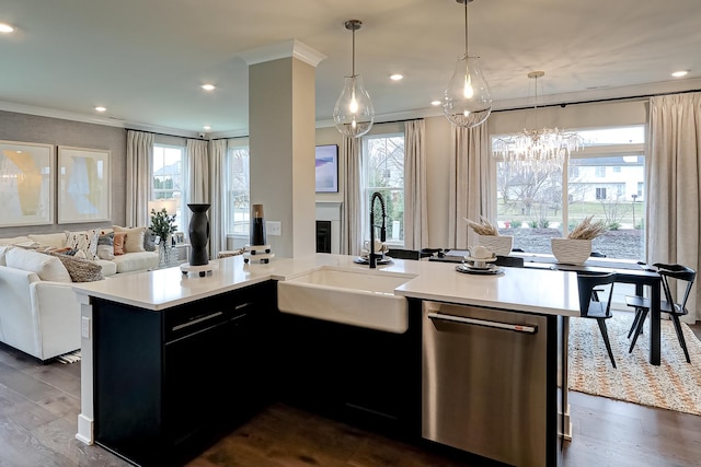 4314 Chelsea Manor Cir, Aurora, IL 60504 - kitchen with dark cabinets, light countertops, dishwasher, a sink, and open floor plan