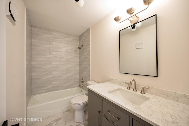 full bath with vanity, marble finish floor, shower / tub combination, and toilet
