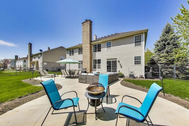 view of patio / terrace with an outdoor living space with a fire pit and outdoor dining area
