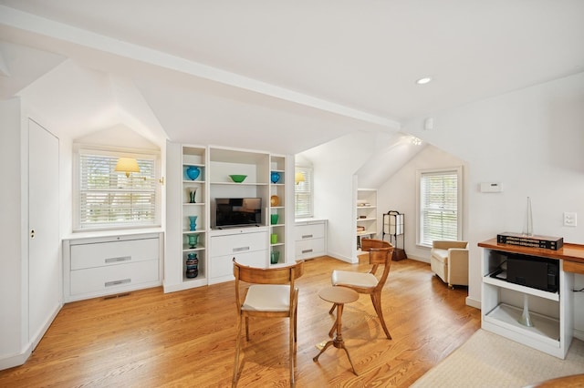 living area with visible vents, recessed lighting, vaulted ceiling, light wood finished floors, and baseboards
