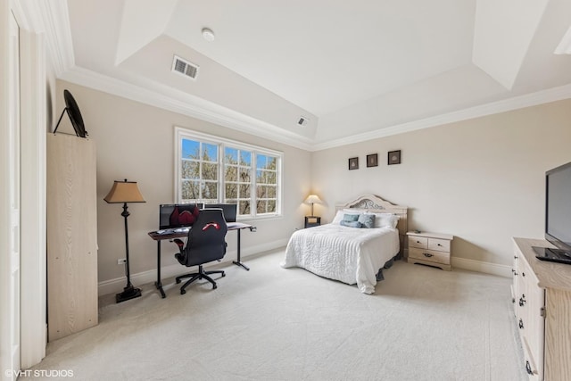bedroom with a raised ceiling, visible vents, baseboards, and light carpet