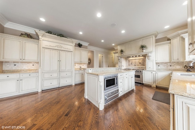 kitchen featuring stainless steel appliances, decorative backsplash, ornamental molding, and a warming drawer