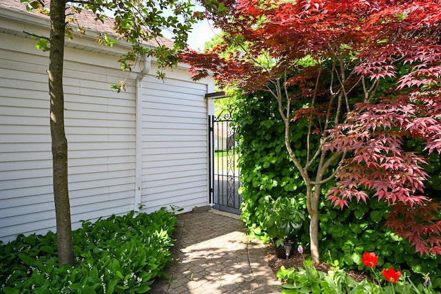 view of outdoor structure with a gate