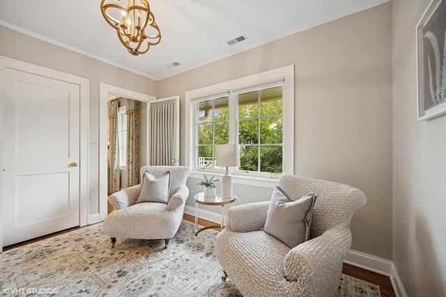 495 Willow Rd, Winnetka, IL 60093 - sitting room with a chandelier, baseboards, ornamental molding, and wood finished floors