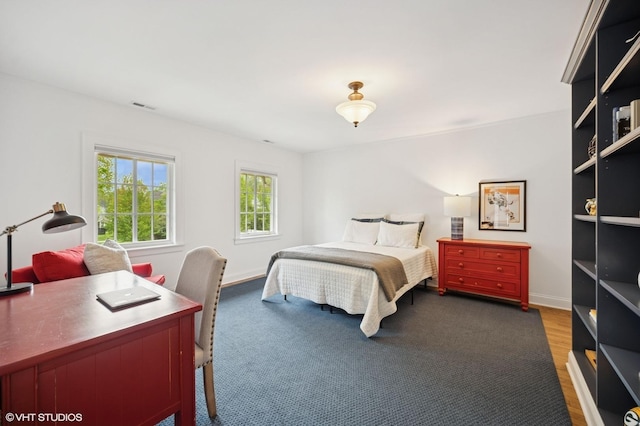 495 Willow Rd, Winnetka, IL 60093 - bedroom featuring an office area, baseboards, and wood finished floors