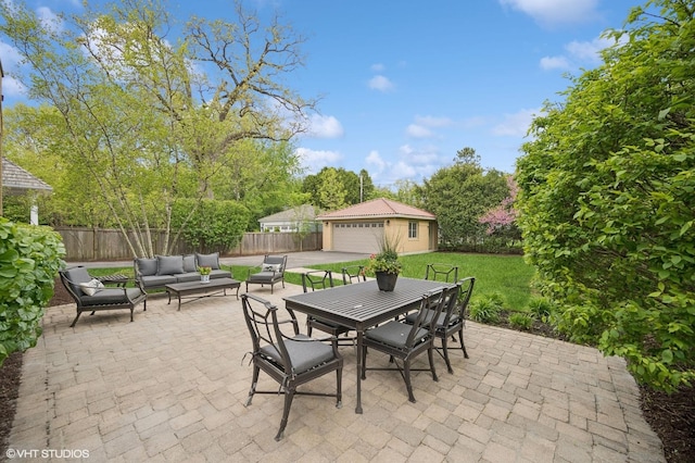 495 Willow Rd, Winnetka, IL 60093 - view of patio / terrace with an outdoor hangout area, an outbuilding, outdoor dining space, and a detached garage