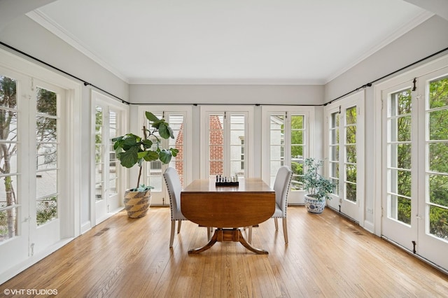 495 Willow Rd, Winnetka, IL 60093 - sunroom with french doors, healthy amount of natural light, hardwood / wood-style flooring, and crown molding