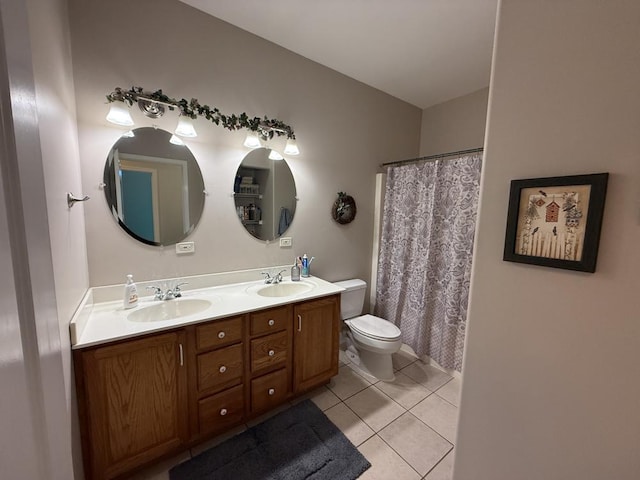 17N975 Harmony Rd, Hampshire, IL 60140 - full bath with double vanity, a sink, tile patterned floors, and toilet
