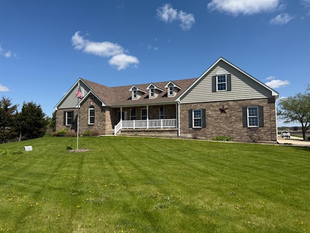 17N975 Harmony Rd, Hampshire, IL 60140 - view of front of house with a porch, brick siding, and a front yard