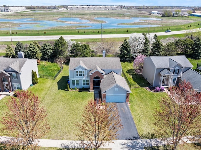 drone / aerial view featuring a water view