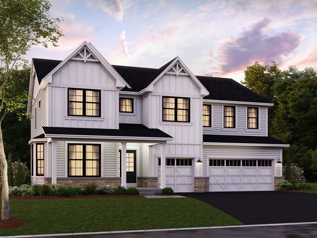 26 Open Pkwy, Hawthorn Woods, IL 60047 - modern inspired farmhouse with driveway, board and batten siding, an attached garage, and stone siding