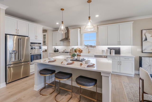 26 Open Pkwy, Hawthorn Woods, IL 60047 - kitchen featuring tasteful backsplash, white cabinets, stainless steel appliances, and wall chimney range hood
