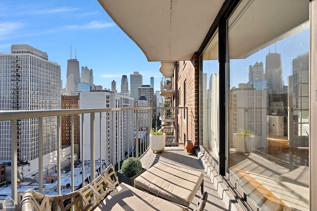 balcony featuring a view of city
