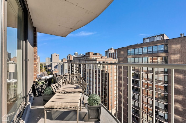 balcony featuring a city view