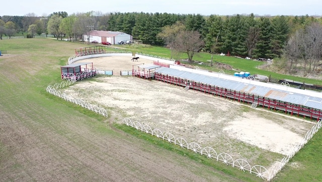 drone / aerial view featuring a forest view