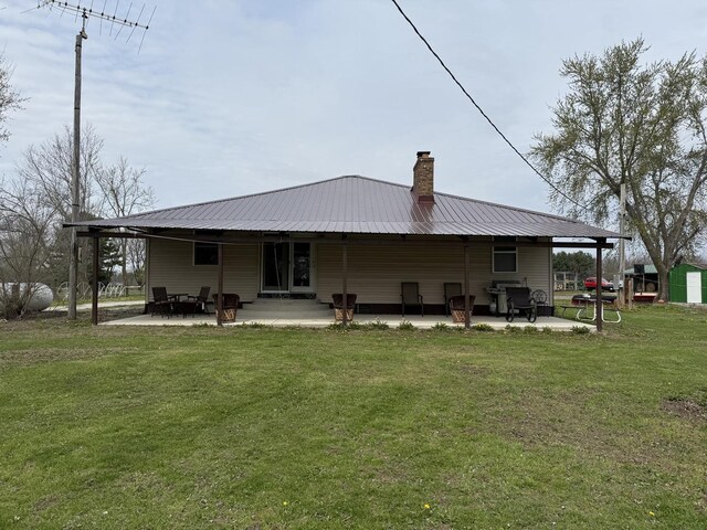 view of yard with exterior structure and an outdoor structure