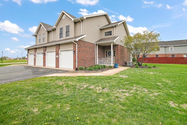 view of front of house with brick siding, central AC, fence, aphalt driveway, and an attached garage