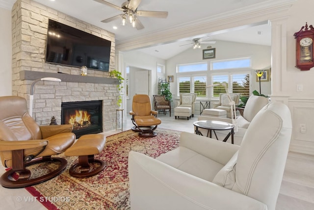 13 Briden Ln Unit 13, Sycamore, IL 60178 - living room featuring a ceiling fan, vaulted ceiling, a fireplace, and crown molding